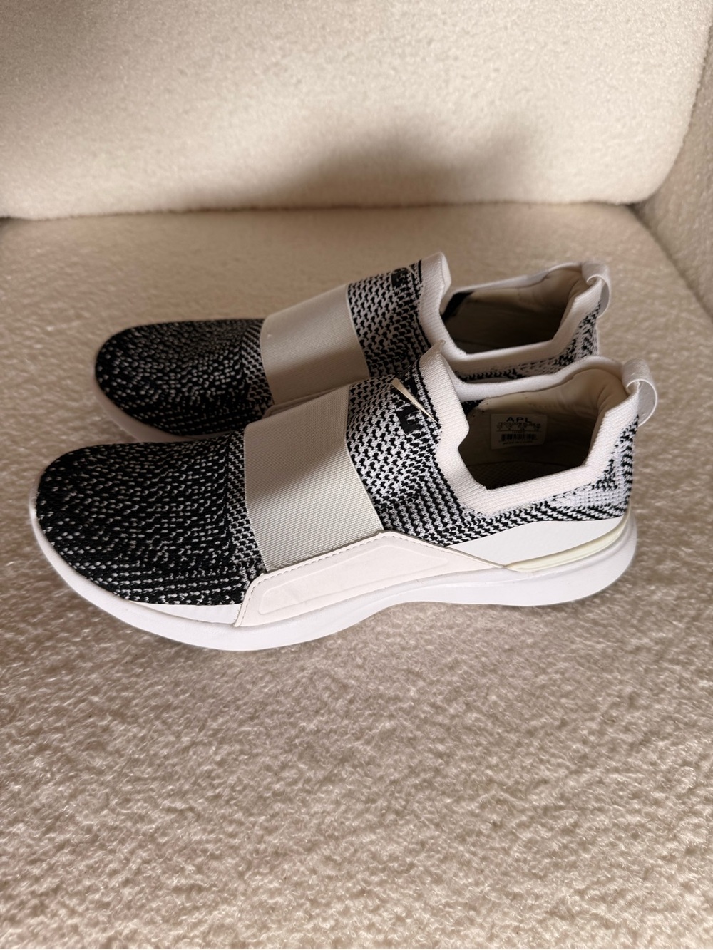 APL Women's Black and White Slip-On Sneakers